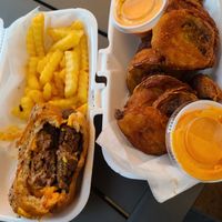 Big dipper burger and fried green tomatoes. at Bean Me Up Scottie Organic Eatery in Tuscaloosa