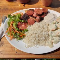 Prato feito com churrasco at Girassol Veg in Florianopolis