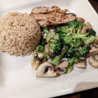 Veggie feast (Pan fried vegan fish with ginger and sauteed mushroom garlic with broccoli, served with rice.) at Simple Joy in Honolulu