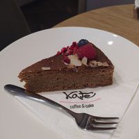 Pretty and tasty. This one is citrus cake, very moist with coconut sugar 😍 at Kate Coffee & Cake in Gdynia