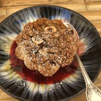 Flan végan bananes noisettes  speculos et coulis framboises   at Le Nid in Dijon