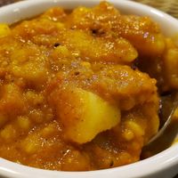 Aloo puri (R$27). Simple, spicy and vegan potato curry with fried bread. Comfort food. at Tempero Indiano in Sao Paulo