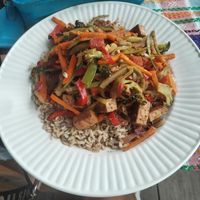 Tofu brown rice Asian stir fry 😋 at The Fifth Dimension in San Pedro La Laguna