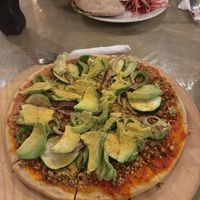 Super vegano pizza, with nut meat. Healthy and tasty. at The Fifth Dimension in San Pedro La Laguna