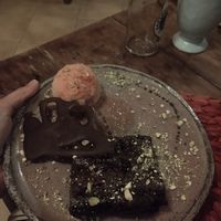 Chocolate Brownie 🍫 with Raspberry Sorbet 🍧 at Esfigueral in Ibiza