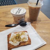 Cherry pistachio pop tart and caramel latte. at Cartel Coffee Lab - Downtown Phoenix in Phoenix