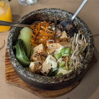 Vegan kimchibowl with tofu, vegetables and rice and kimchi at Kimchibowl  in Malaga