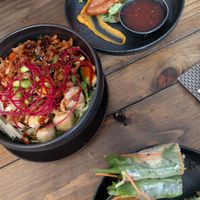 Gao bowl, spring rolls and vegan chicken wings at GAO Vegan in Leipzig