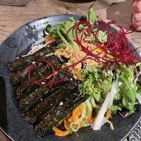 Rice noodles, vegetables and rolls filled with tofu/mushroom   at GAO Vegan in Leipzig