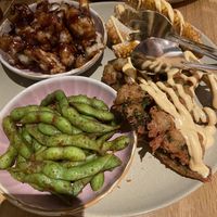 Vegan sampler with corn “ribs”, sweet & sour cauliflower, edamame, and beer battered broccolini. The cauliflower was so delicious   at Moku Bar + Grill in Cairns