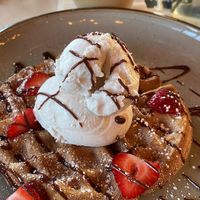 Vegan churro waffle w/vanilla ice cream and an iced oat milk latte!  at Good Morning in Las Vegas