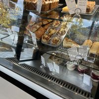 Case with some baked goods (clearly labelled vegan items)   at Whitebark Cafe in Banff