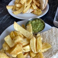 Chip butty with mushy peas at Neptune Fish Restaurant in Seahouses