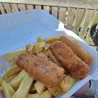 Battered sausages and chips at Neptune Fish Restaurant in Seahouses