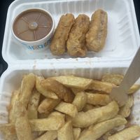 Sausage and curry sauce it was all really nice and not greasy at alll  at Neptune Fish Restaurant in Seahouses