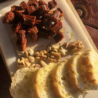 Vegan chorizo with bread and nuts  at Chiringuito PataPalo in Arousa