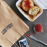Takeaway straight edge biscuit with strawberry jam at Guerilla Bizkits in Nashville