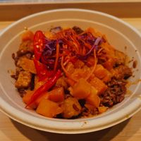 red rice, marinated tofu, pumpkin, satay sauce, chili and asian coleslaw at Rice Up - The Circle in Kloten