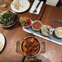 Trio of dips with chickpea salad and spicy potatoes at Eli Falafel - Fucheng Rd in Shanghai