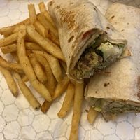 Falafel wrap with fries  at MoMo's Kebab in Des Moines