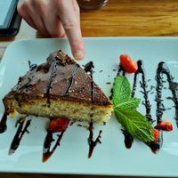 Vegan dessert - this day it was a huge chunk of pistachio cake at Tribo da Praia in Ferrel