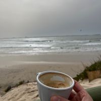 Oat milk and perfect view   at Tribo da Praia in Ferrel