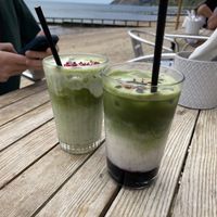 Iced matcha lattes with oat milk  at Fins Beach Cafe in Sandown