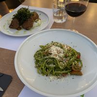 Purple eggplant roll w/ vegan feta sauce & linguine w/ fresh pesto + vegan parmesan. at 5SENSES Restaurant in Santorini