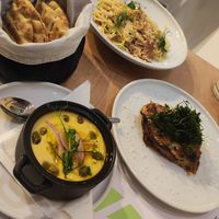 clockwise - pita bread, carbonara, moussaka, fava at 5SENSES Restaurant in Santorini