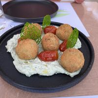 Potato croquettes. Good herb cream sauce, but the croquettes themselves were like glue.   at 5SENSES Restaurant in Santorini