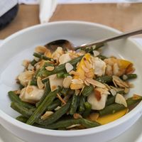 Nanobean.. Peach, Green beans, vegan burrata and almonds   at 5SENSES Restaurant in Santorini