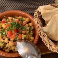 Chickpea salad (starter) with bread  at YabaOf in Marbella