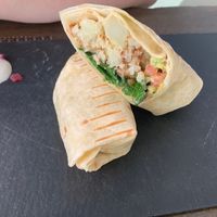 Cauliflower wrap with non-vegan yoghurt decoration  at YabaOf in Marbella