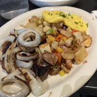 steak, eggs, and home fries  at Champs Diner in Brooklyn