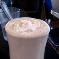Coffee with whipped cream... the cream is really good. at Champs Diner in Brooklyn