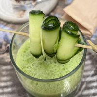 Detox juice and vegan brownie  at Almond in Paros