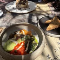 Vegan pancakes with almond butter and chocolate and the vegan pokebowl with sweet potato.  at Almond in Paros