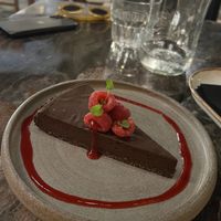 Chocolate torte, the base was like tolberone! Highly recommend  at Almond in Paros