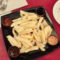 Patates amb 4 salses veganes at Restaurante El Cortijo in Montblanc