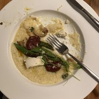 Marsh Hen Mill Grits with snap peas, fennel, strawberries, and almond ricotta  at The Green House in Wilmington