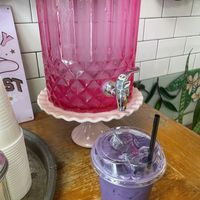 Ube latte and water station  at Valkyrie Doughnuts in St Petersburg