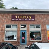 Totos storefront at Toto's Pizzeria in Philadelphia