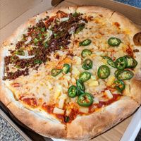 VEGAN pizza! First half: vegan beef, onions, and green peppers. Second half: pineapple and jalapeno. at Sergio's in Midlothian