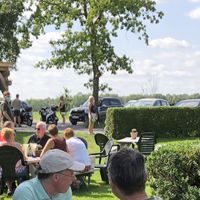 Nice seating outdoor with playground for kids at Gelato Farm Teuven in Voeren