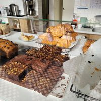 Brownie in back are vegan, also cakes and most croissants at Massolit Books & Café in Krakow