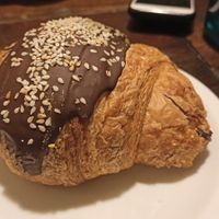 Croissant with chocolate and tahini at Massolit Books & Café in Krakow