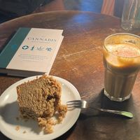 cake, drink, book  at Massolit Books & Café in Krakow