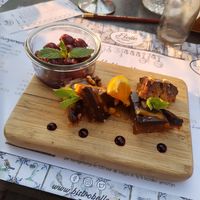 Dessert with nuts, dark chocolate, orange and warm cherries at Bistro Belle in Oud Zuilen