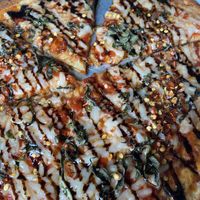 Cauliflower crust pizza with house-made marinara, vegan cheese, balsamic glaze, and red pepper flakes at Shotti's Point in Ocean City