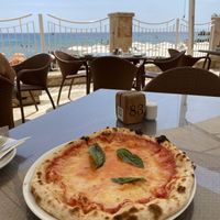 Pizza vegana with a vieww  at Agliolio in Il-qrendi